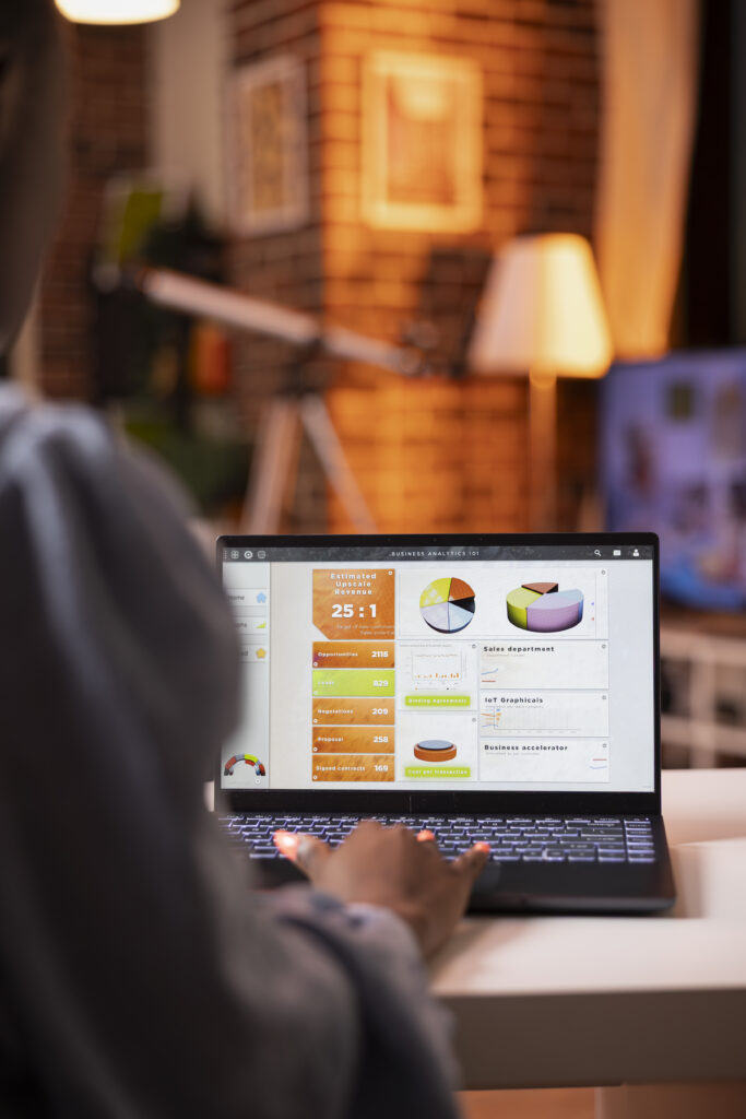 closeup of african american woman typing on laptop